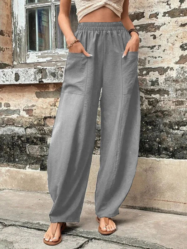 Pantalon ample grande taille avec poches élastiques et couleur unie 