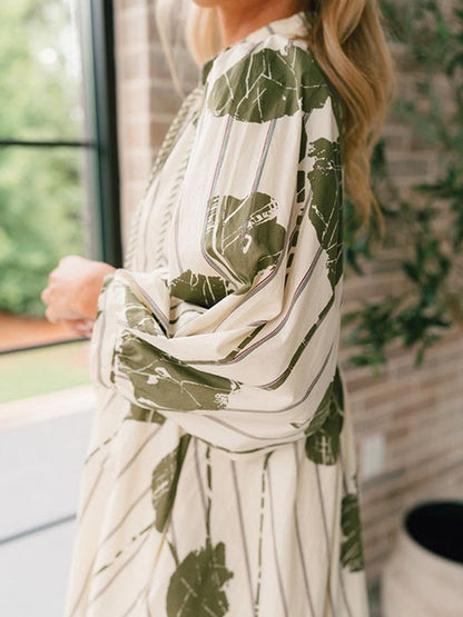 Hoch taillierte, langärmelige, bedruckte Minikleider mit V-Ausschnitt und Bindeband 