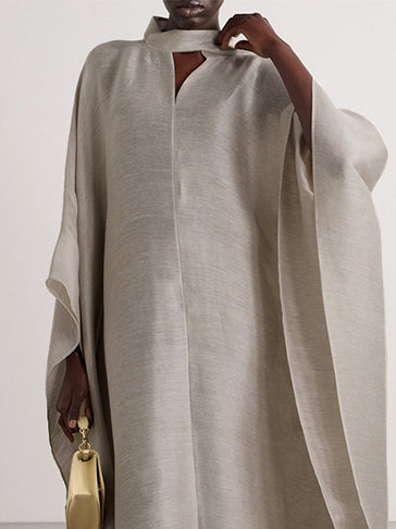 Robe longue ample à manches chauve-souris et col montant de couleur unie 