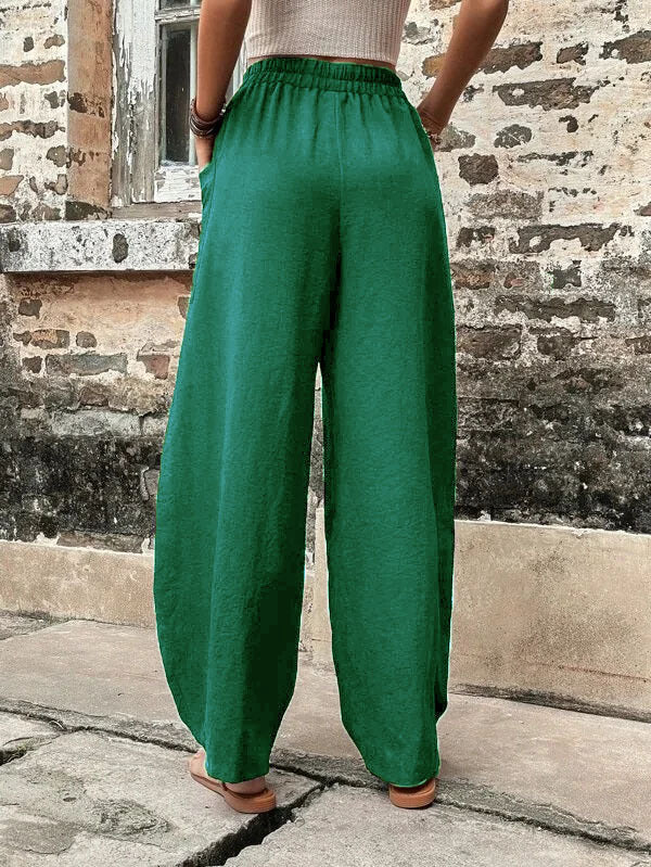 Pantalon ample grande taille avec poches élastiques et couleur unie 