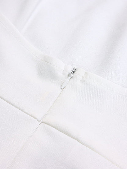 Ensemble deux pièces haut court et pantalon taille haute en dentelle à dos nu et col licou 