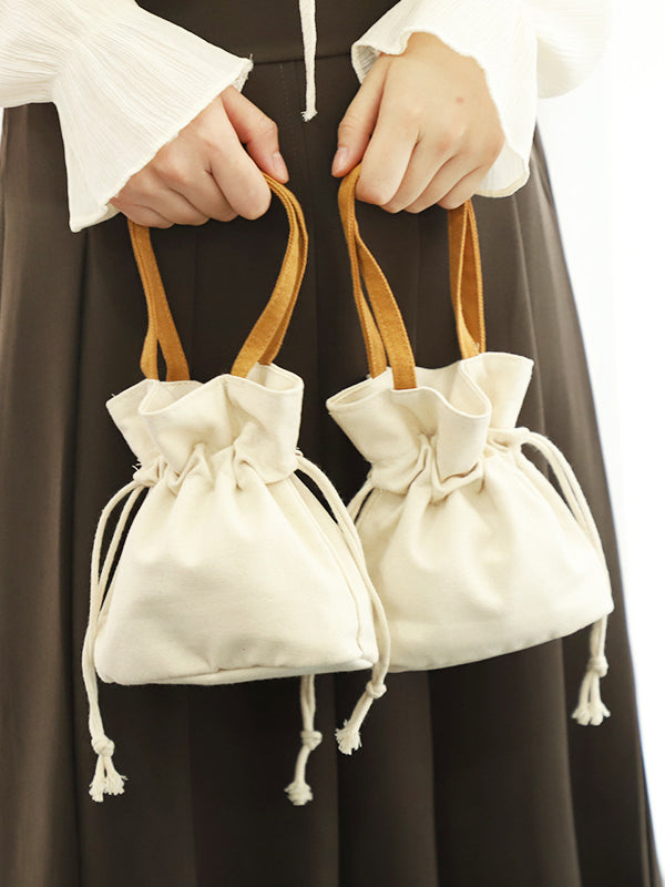 Mini sacs à cordon de serrage et à joint fendu 