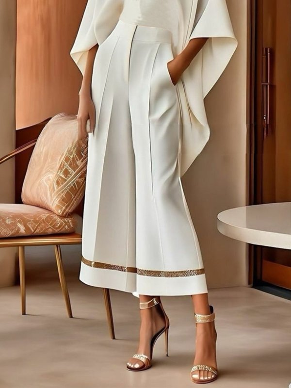 Einfarbige Hose mit weiten Beintaschen 