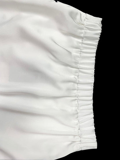 Jupes asymétriques amples à imprimé asymétrique et à fentes 